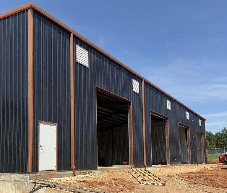 Pre-engineered metal building with overhead cranes at Morgan Truck Body by A & E Real Estate Development